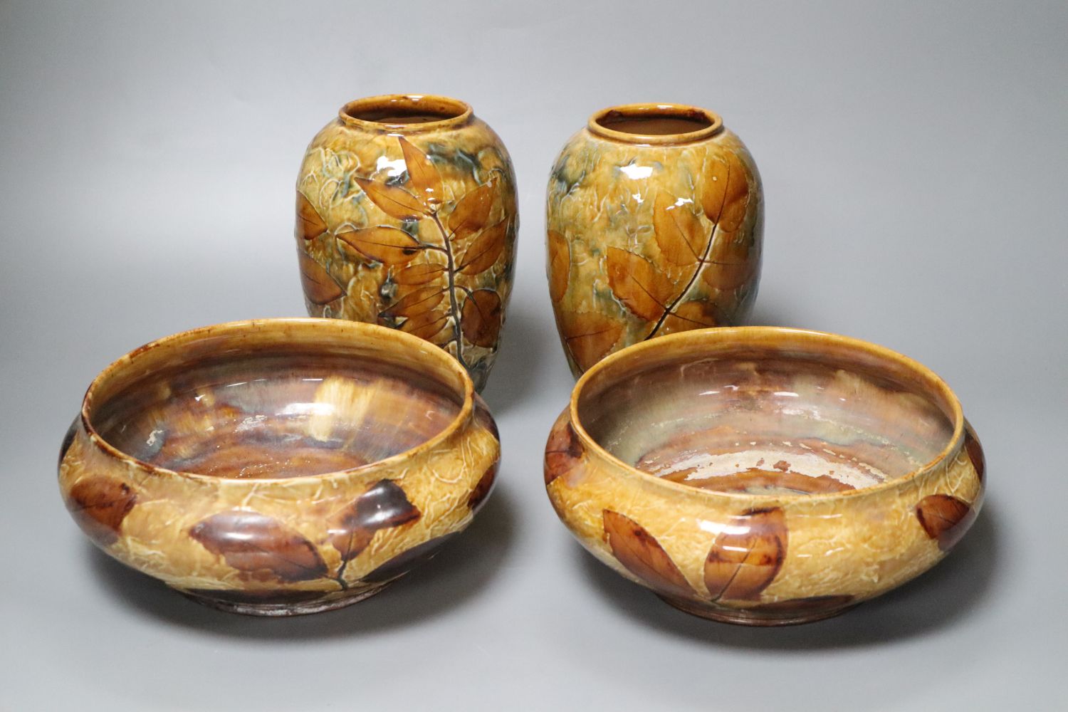 Doulton Natural Foliage Ware: a pair of bowls, 21cm, ovoid vases, 18cm